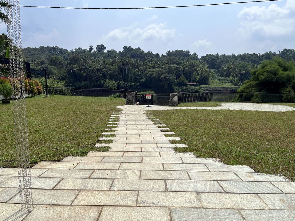 Stone path across the lawn to the river